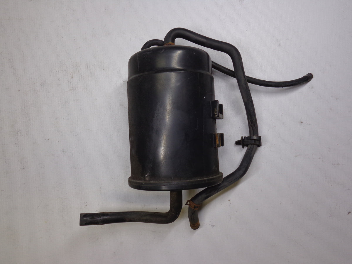 Fuel Evaporator Charcoal Canister Engine Bay Factory Used 19901993 NA
